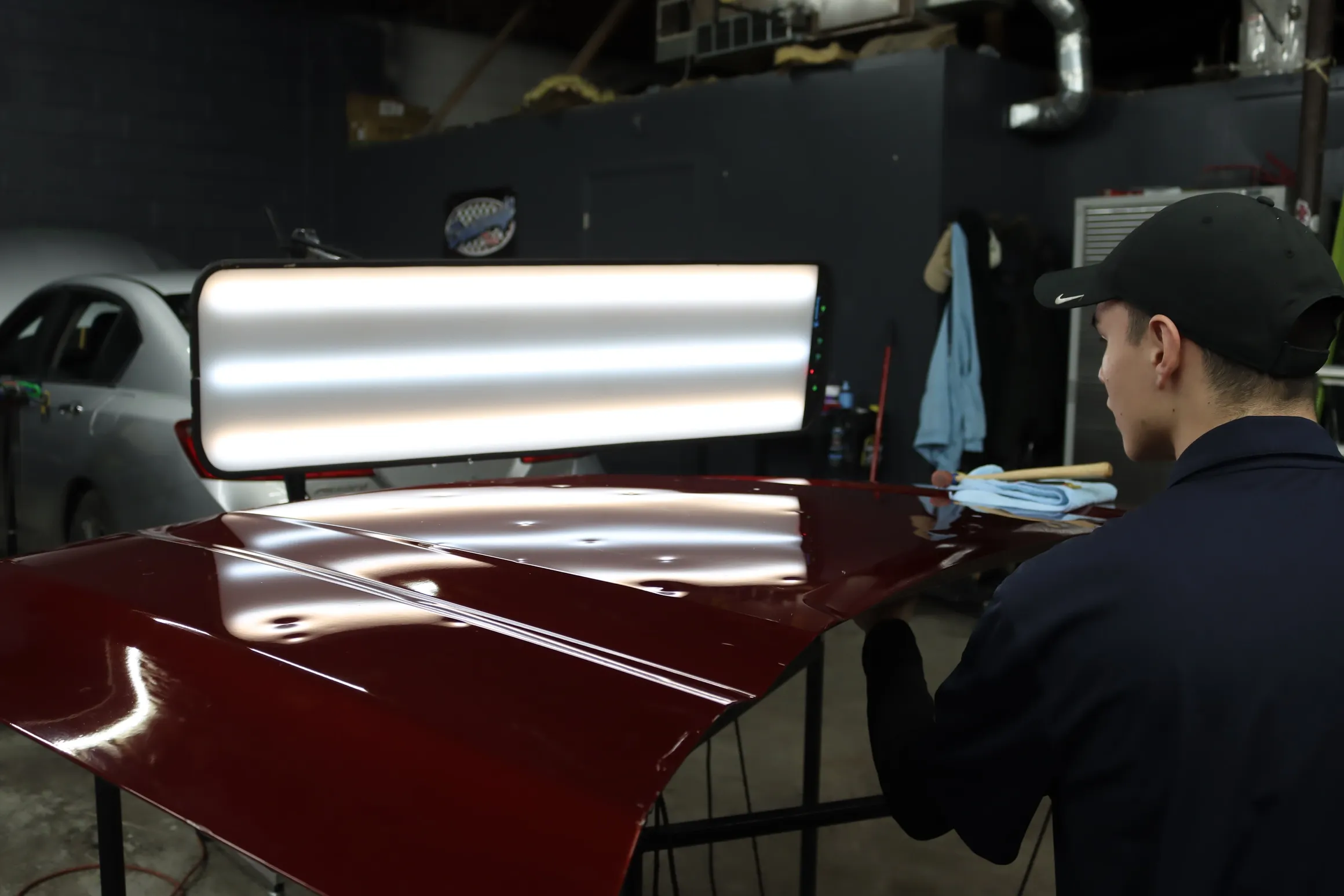 PDR Brothers technicians carefully repairing a vehicle panel